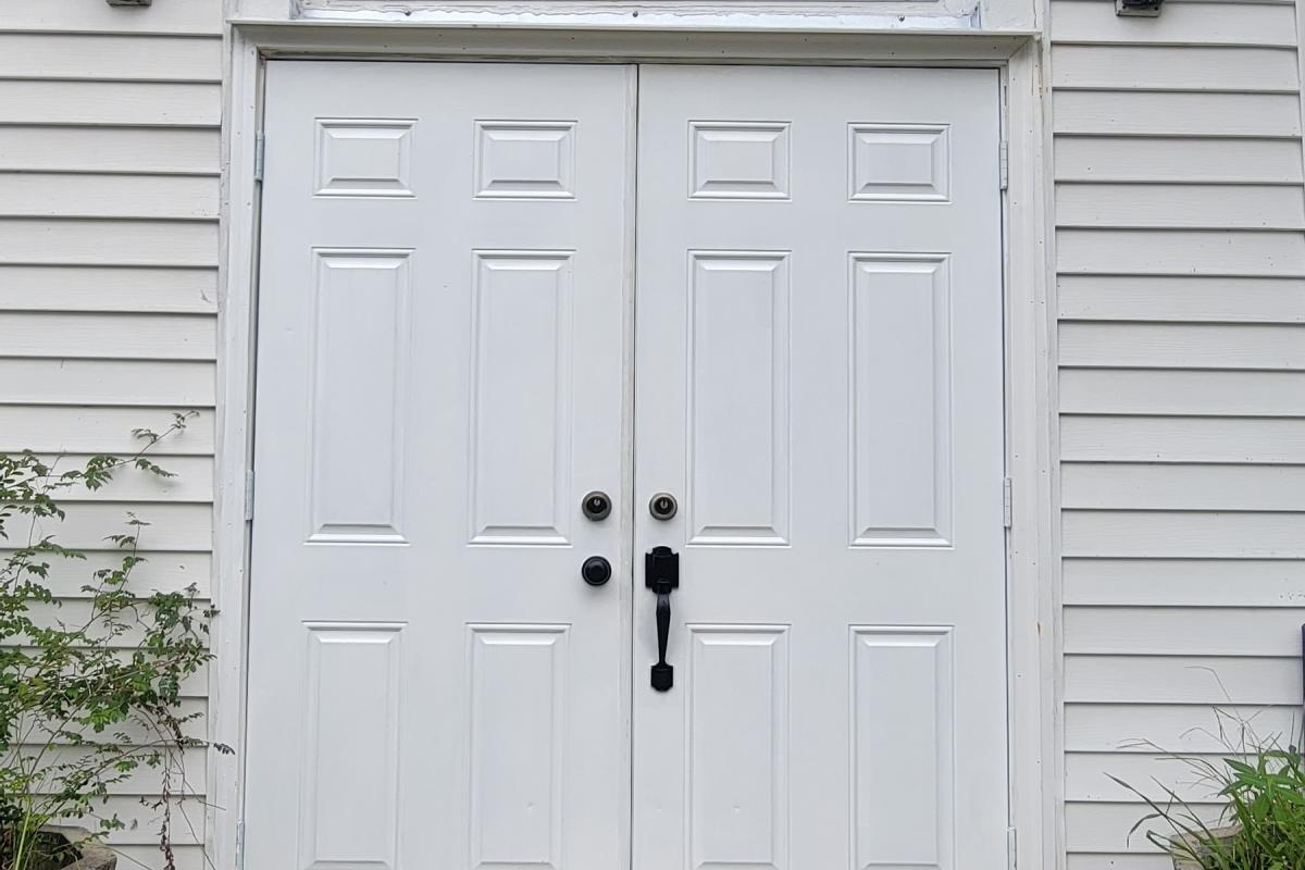 First Baptist Church - After. New painted door and frame repair.